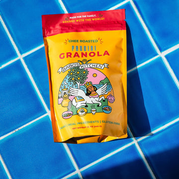 Bag of Granola on a blue tiled surface